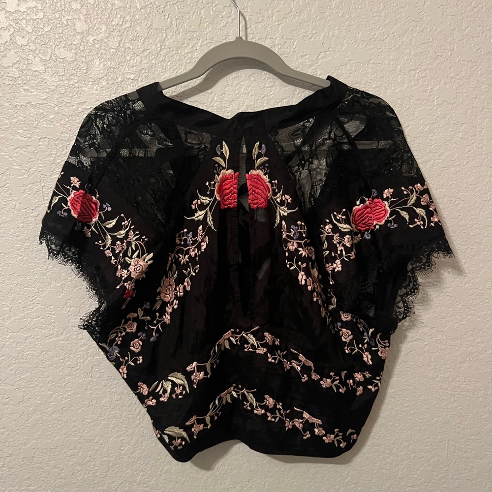free people. size large. black color with details